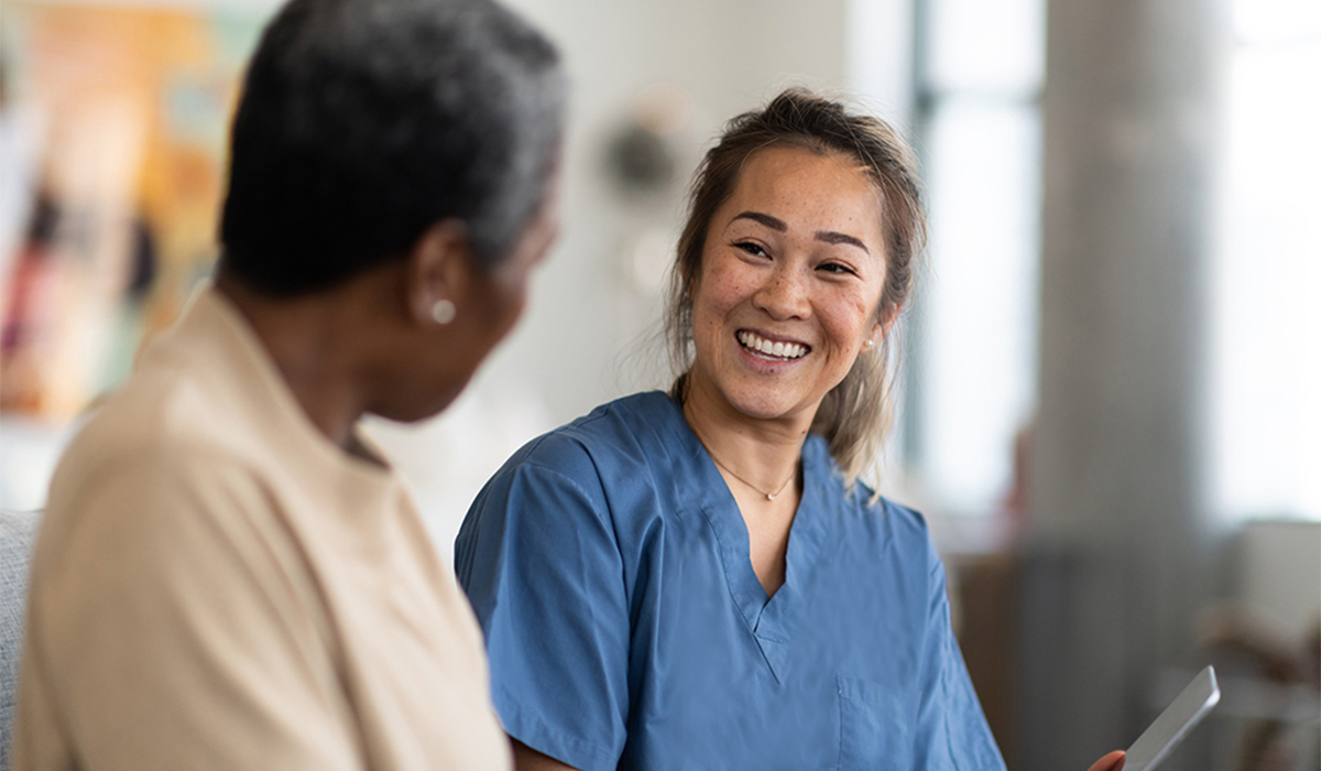 Doctor talking with patient